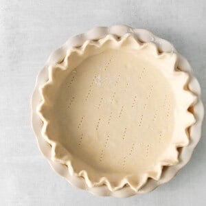 a pie crust is shown on a white background.