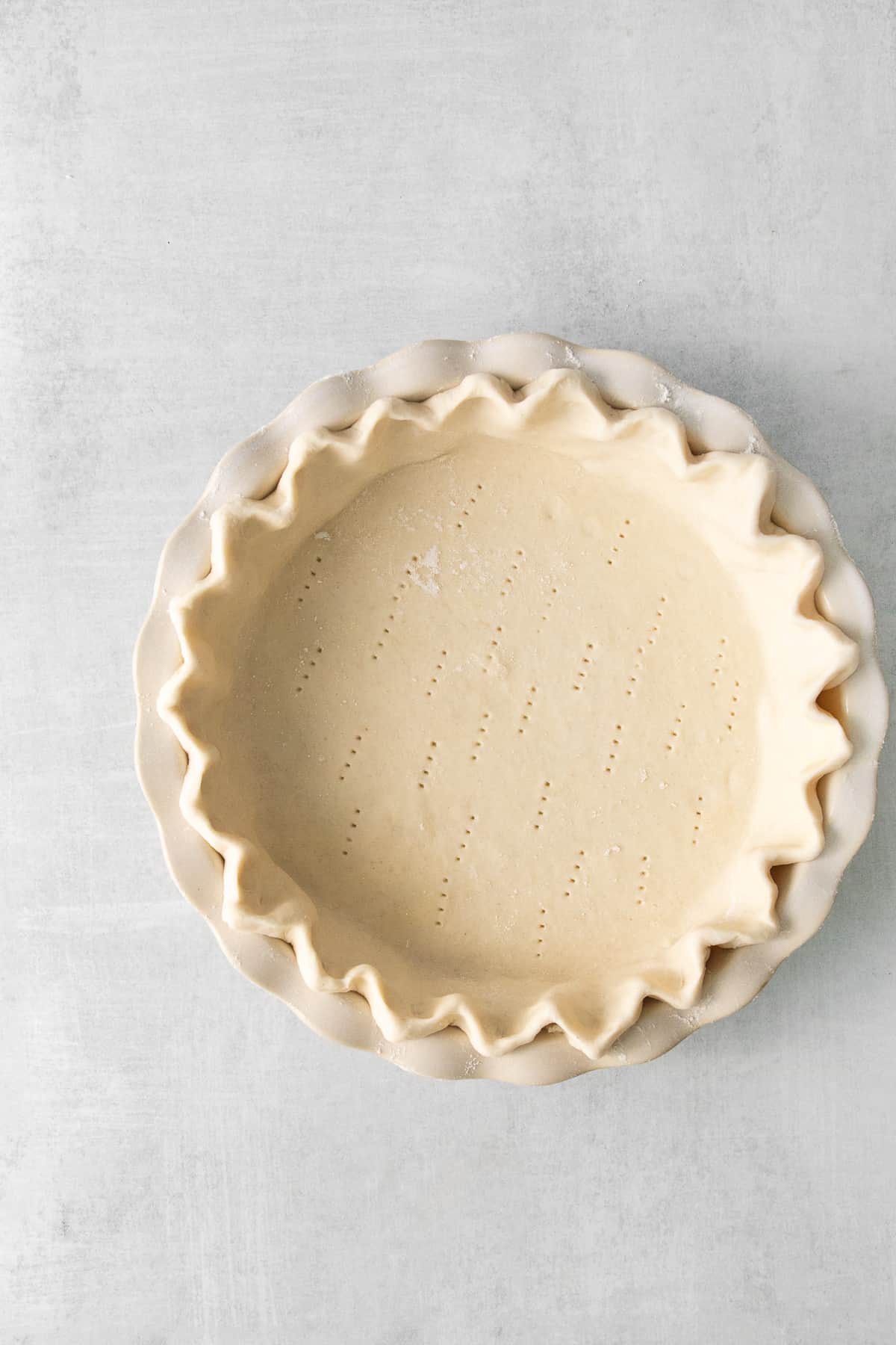Homemade pie crust for quiche lorraine.