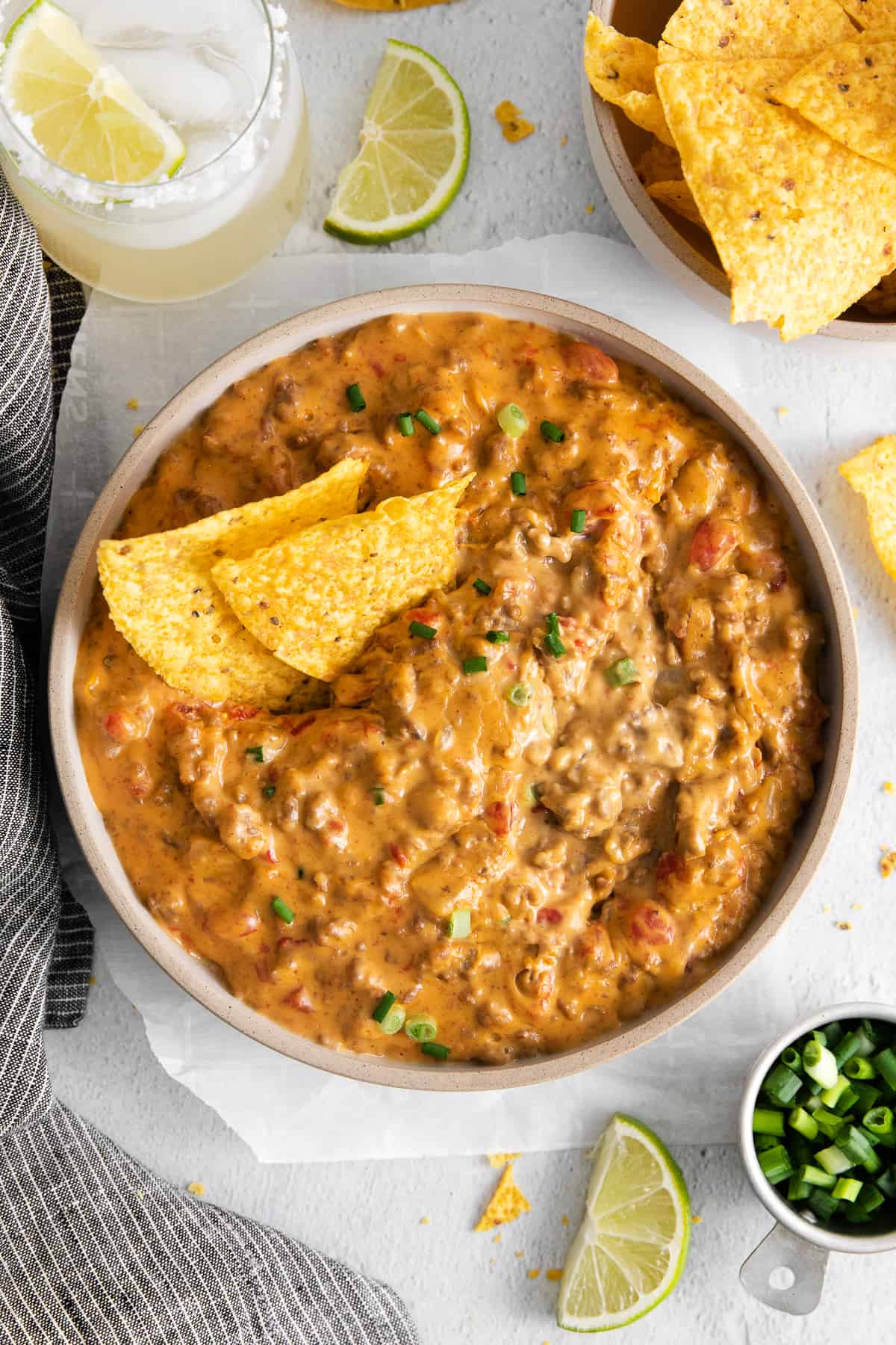 Rotel dip in a bowl with chips.