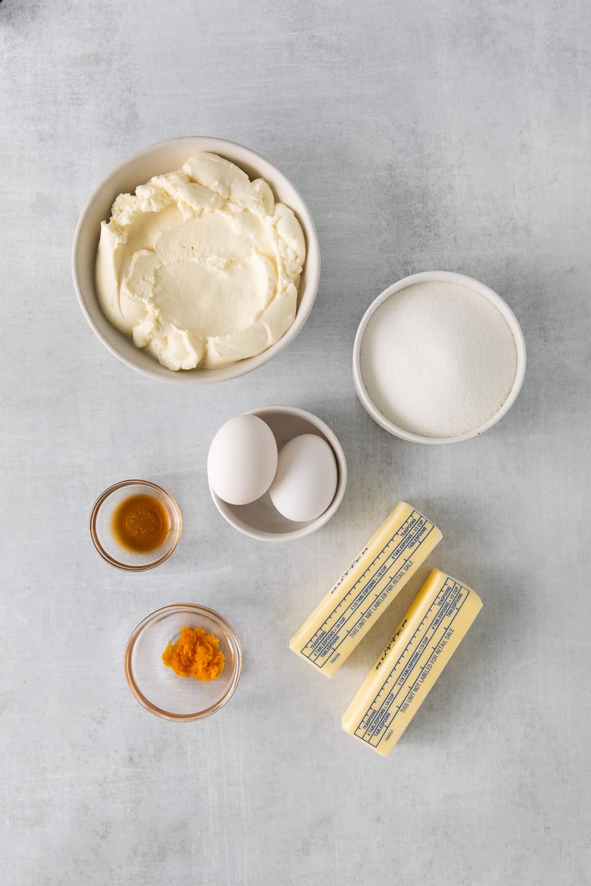 Ingredients for lemon ricotta cookies in bowls.