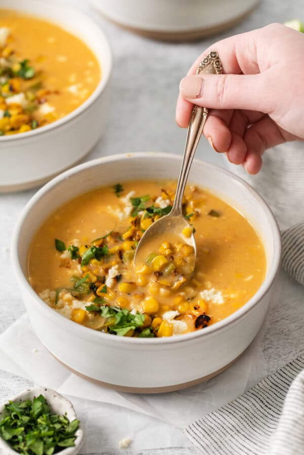 Mexican street corn soup in a bowl.