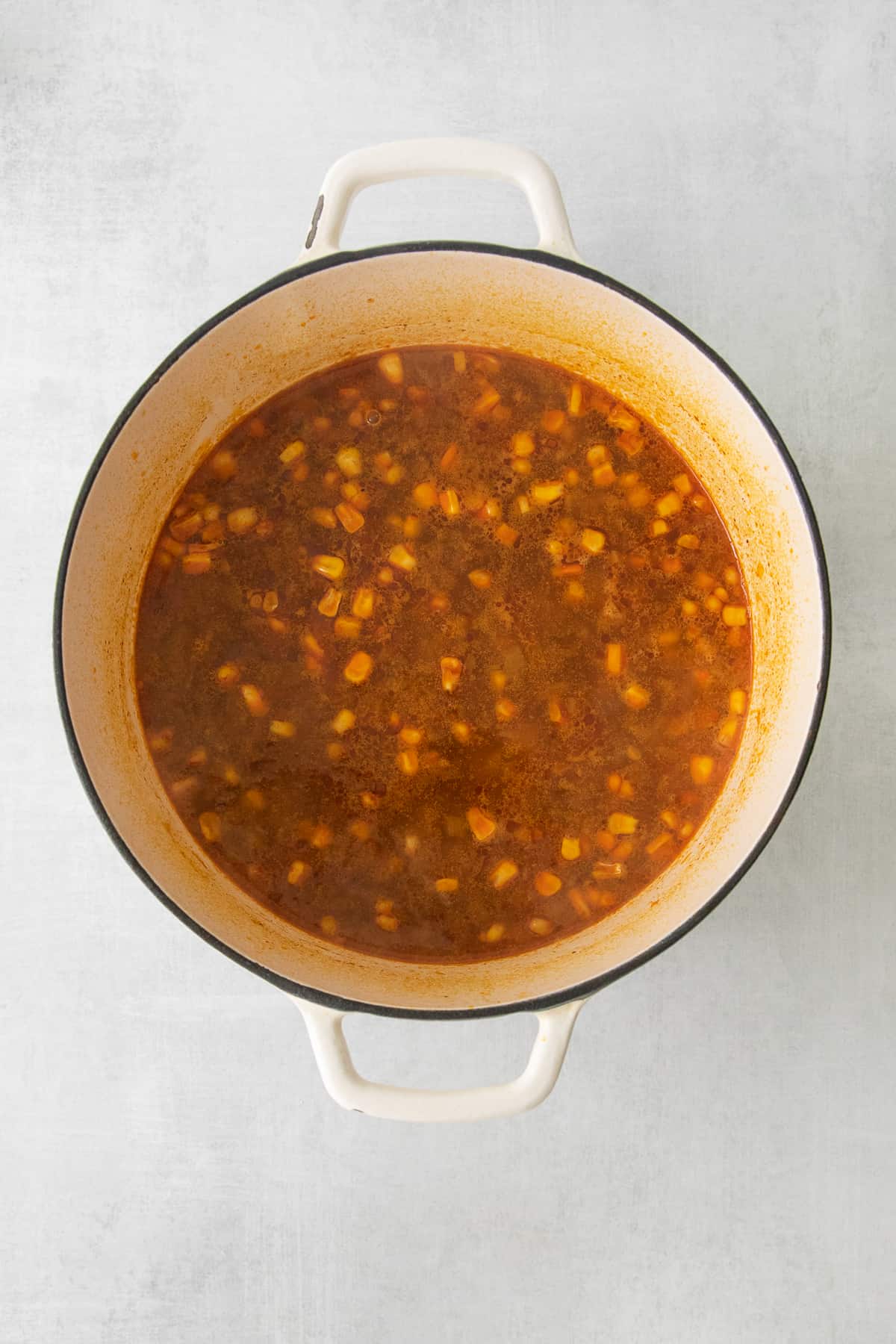 Mexican street corn soup in a stock pot.