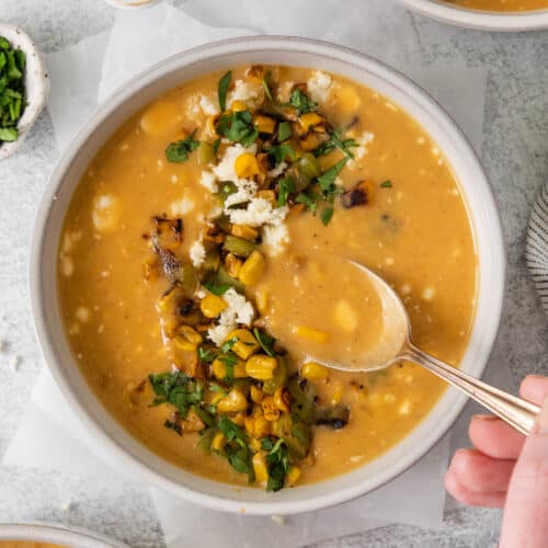 Mexican street corn soup in a bowl.