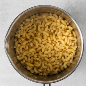 Macaroni noodles in a pot.