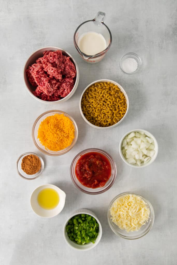 Ingredients for taco mac and cheese in bowls.