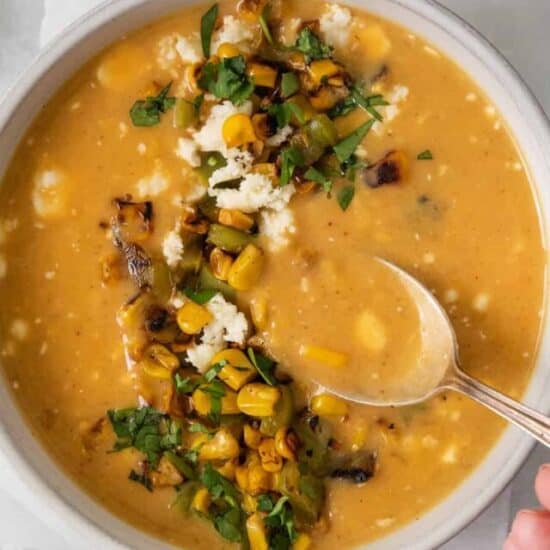 Mexican street corn soup in a bowl.