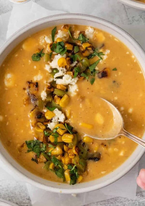 Mexican street corn soup in a bowl.