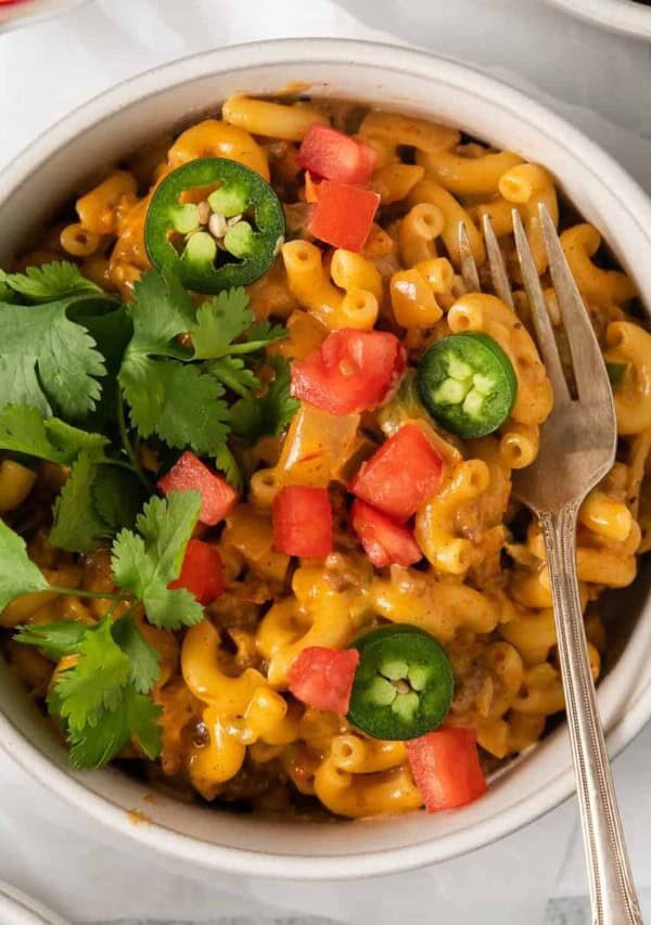 Taco mac and cheese in a bowl.
