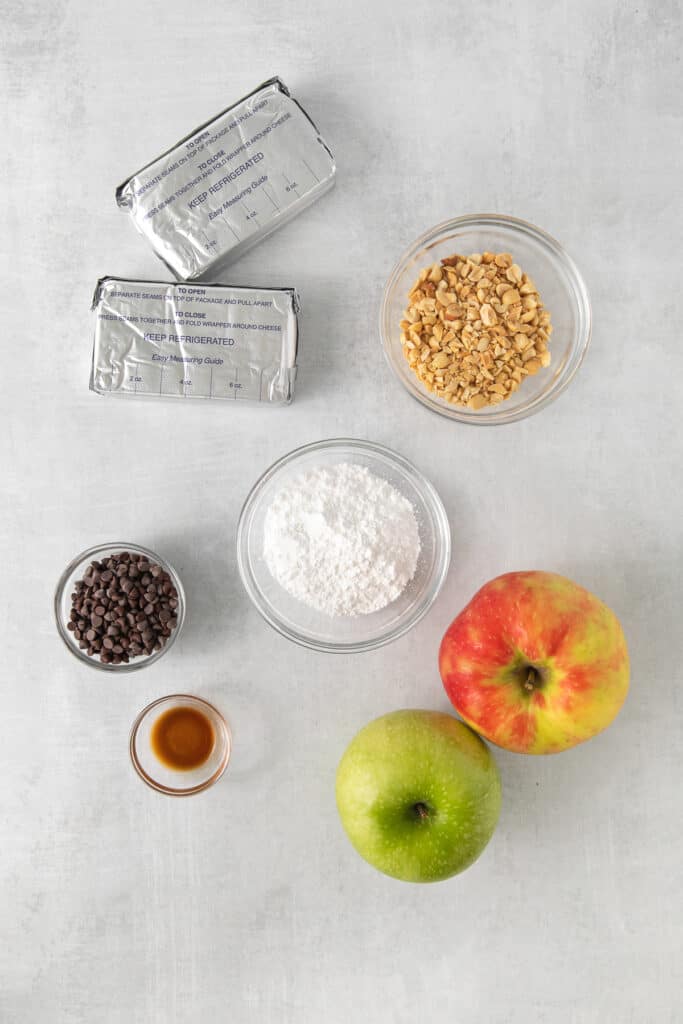 the ingredients for apple cinnamon pancakes are laid out on a table.