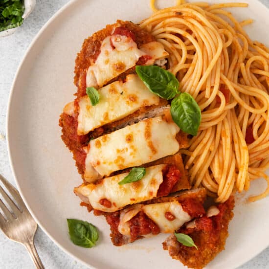 Chicken parmesan on a plate.