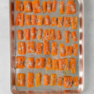sliced carrots on a baking sheet.