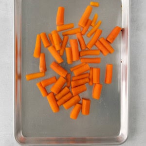 sliced carrots on a baking sheet.