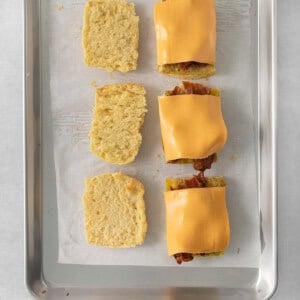 cheesy tater tots on a baking sheet.