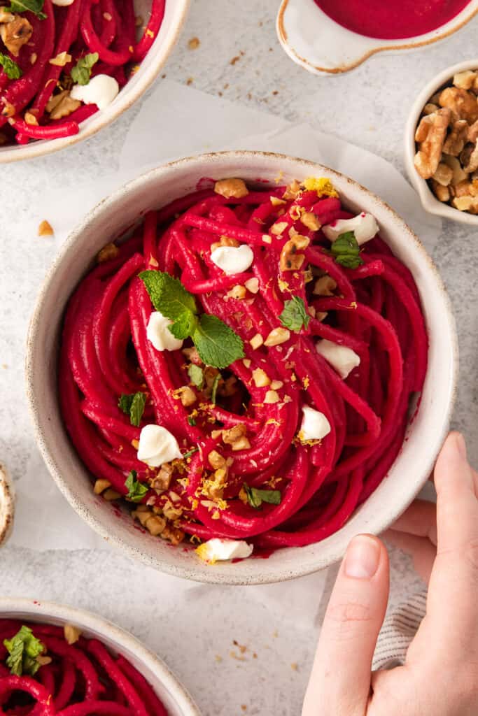 beetroot pasta with feta and walnuts.