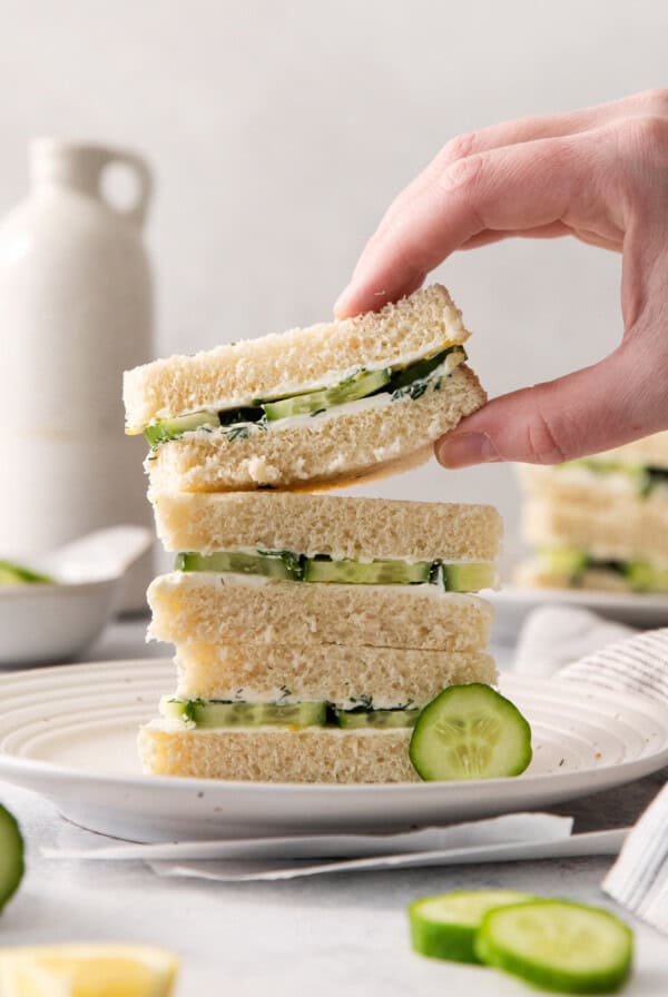 Serving cucumber sandwiches.