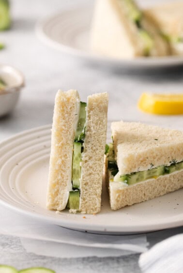 Cucumber sandwiches cut in half.