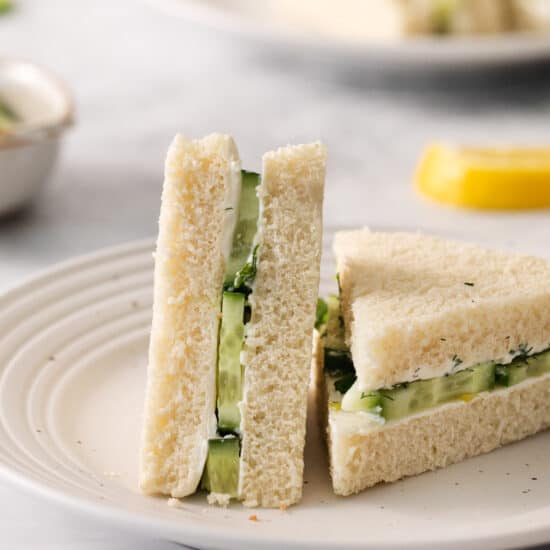 Cucumber sandwiches cut in half.