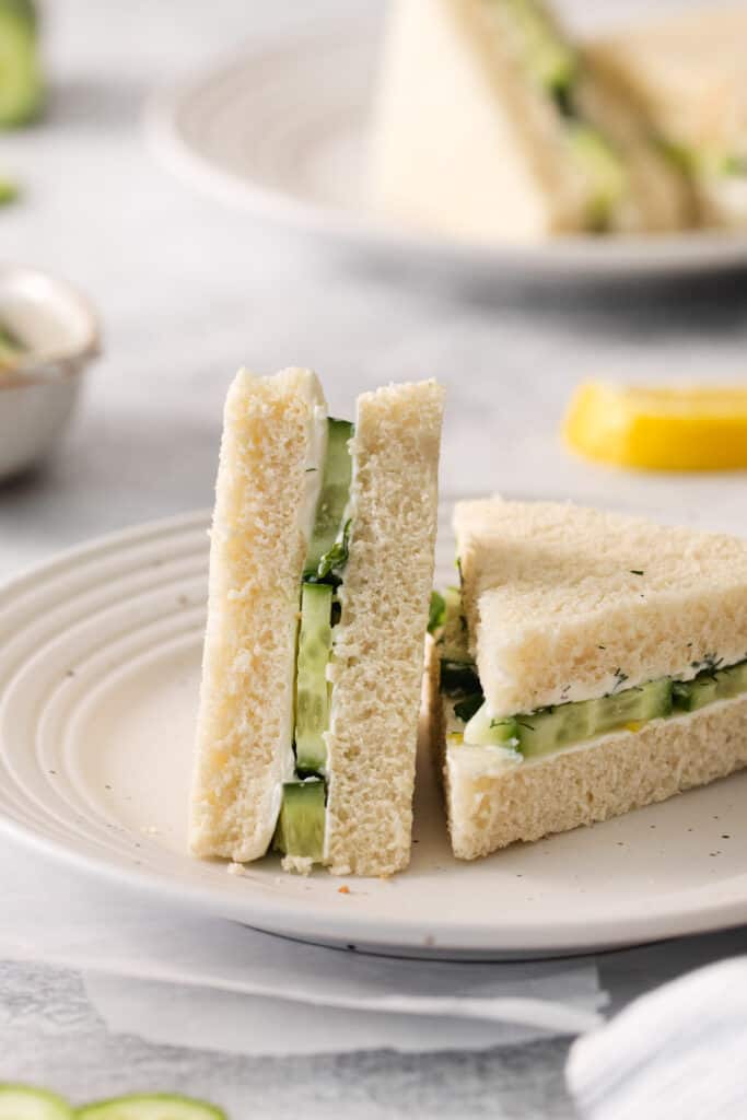 Cucumber sandwiches cut in half.