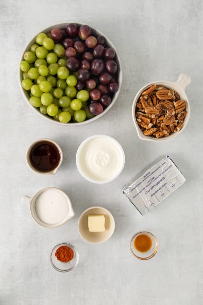 Ingredients for grape salad in bowls.