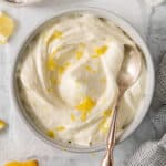 Lemon cream cheese frosting in a bowl.
