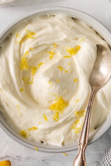 Lemon cream cheese frosting in a bowl.