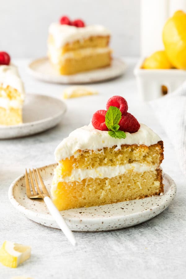 A slice of lemon olive oil cake on a plate.