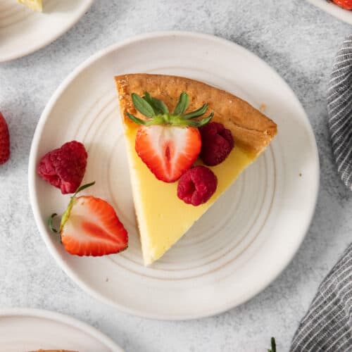 Slice of ricotta pie on a plate.