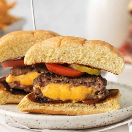 Juicy lucy burger on a plate.