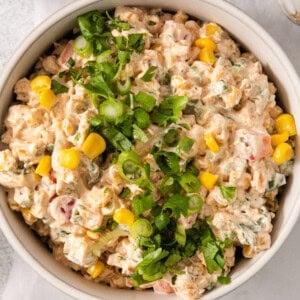 a white bowl filled with a mixture of food.