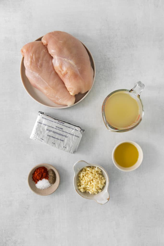 chicken breast ingredients on a white table.