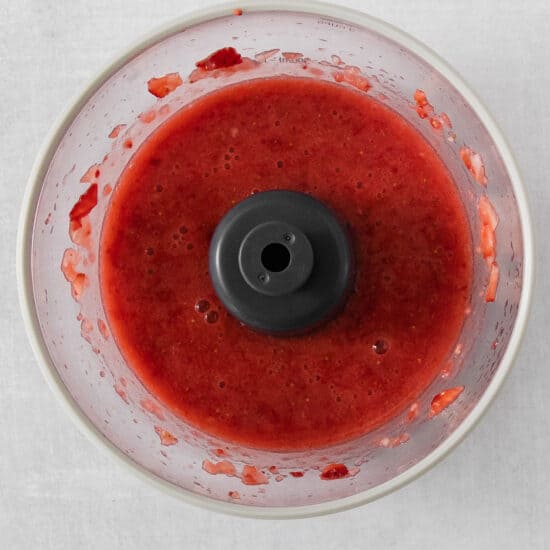 strawberry sauce in a food processor.