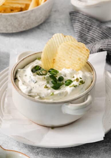 Copycat top the tater in a bowl with potato chips.