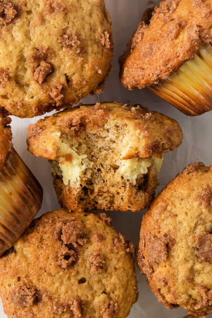muffins with a bite taken out of them.