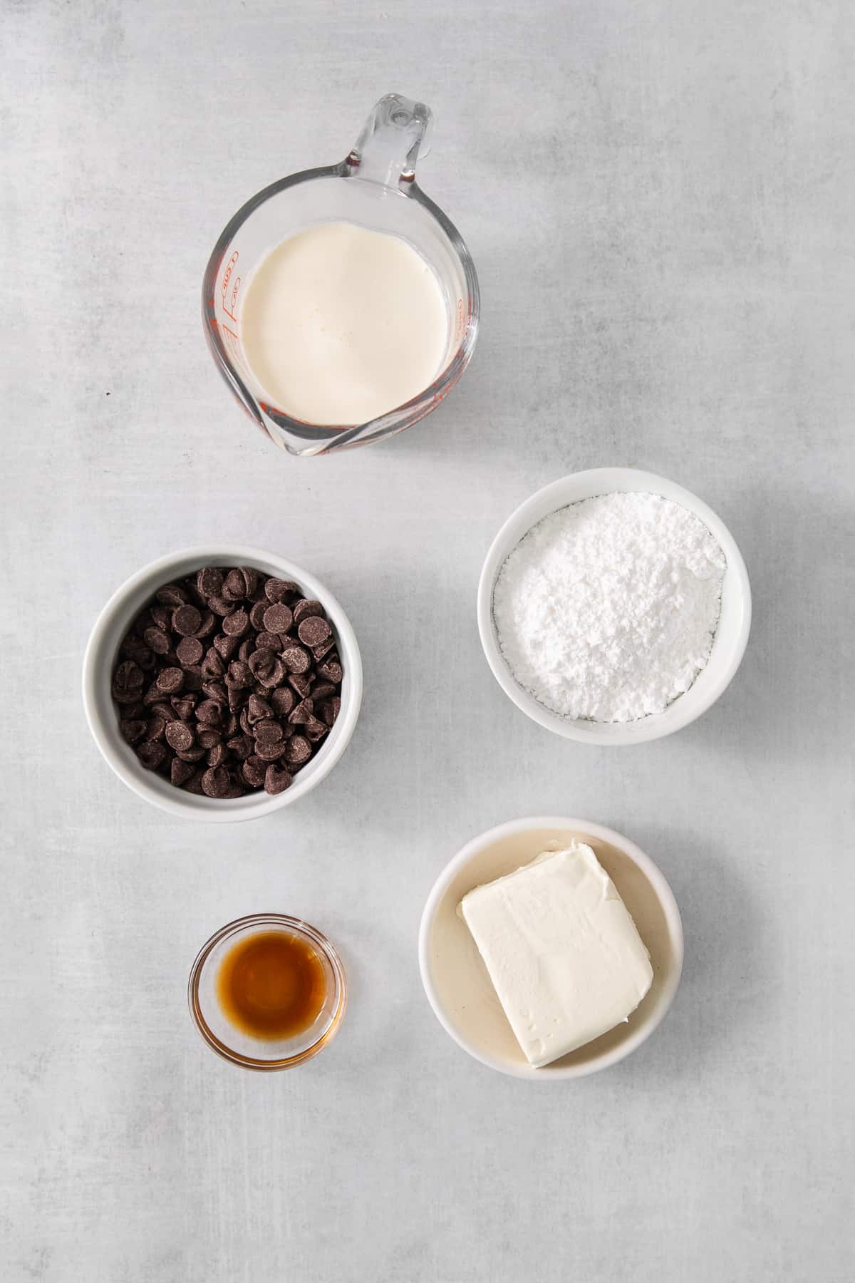 the ingredients for a chocolate cake are shown in bowls.