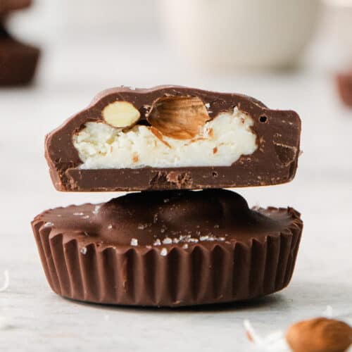 a couple of pieces of chocolate sitting on top of each other.