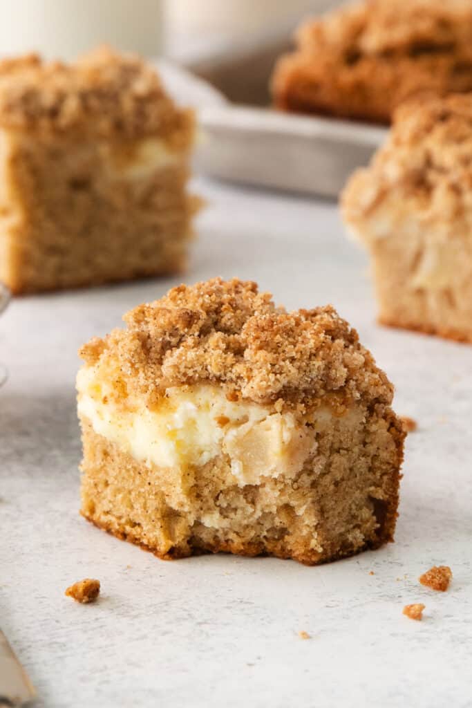 a close up of a muffin with a bite taken out of it.