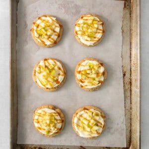 a baking tray filled with mini desserts on top of a table.