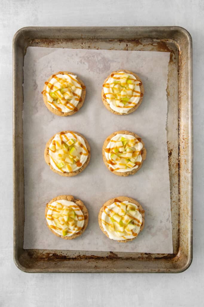 a baking tray filled with mini desserts on top of a table.