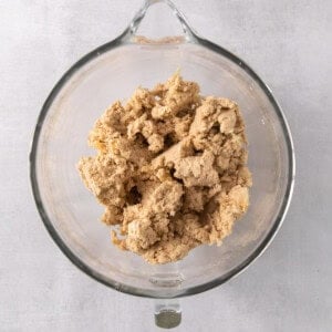 a glass bowl filled with food on top of a table.