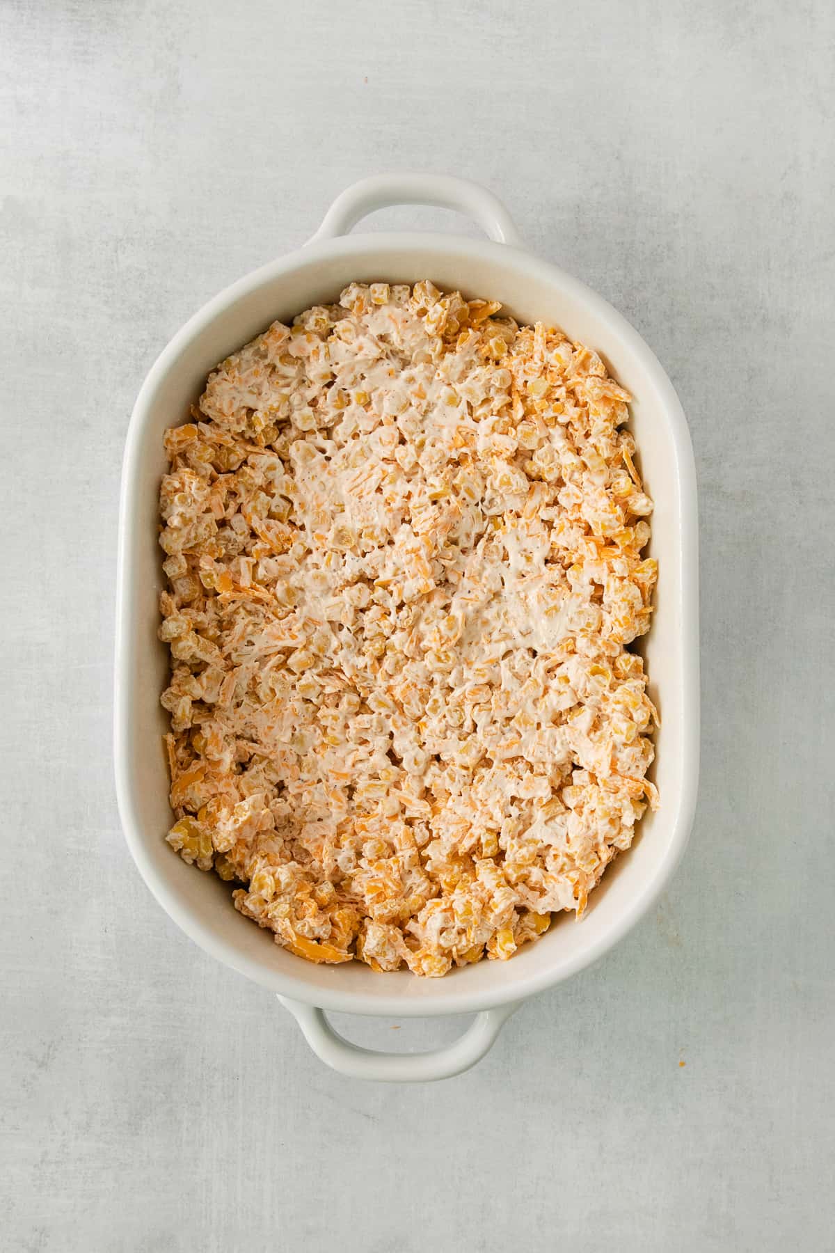 a casserole dish filled with rice and meat.