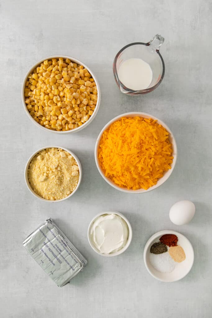 a table topped with bowls filled with different types of food.