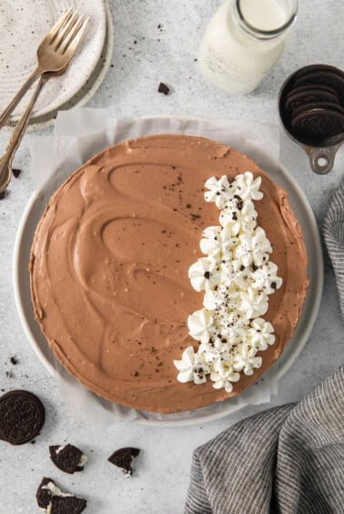 a plate of chocolate cake with marshmallows on top.
