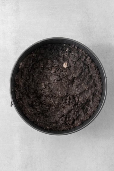 a pot filled with dirt sitting on top of a table.
