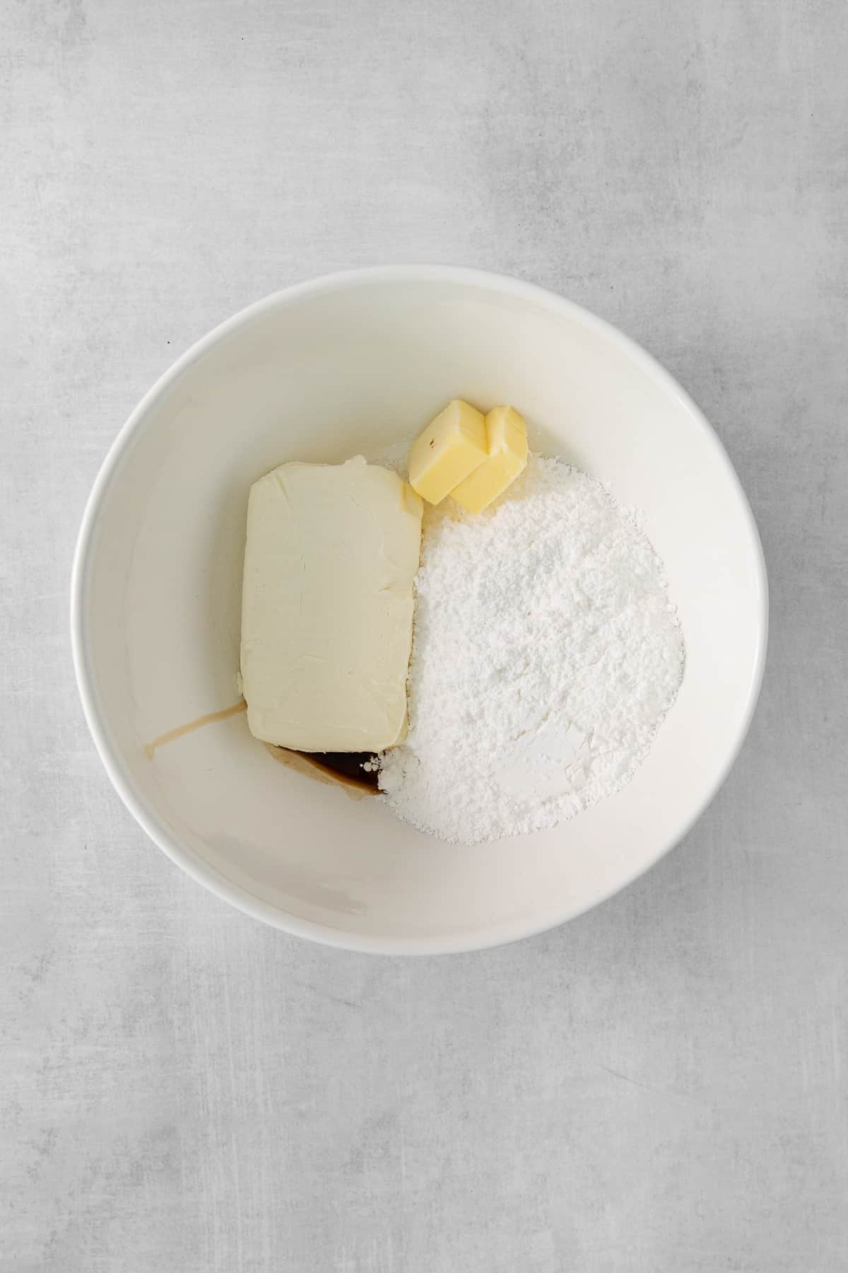 a white bowl filled with different types of food.