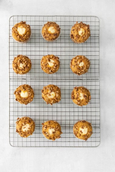 pumpkin muffins on a cooling rack.