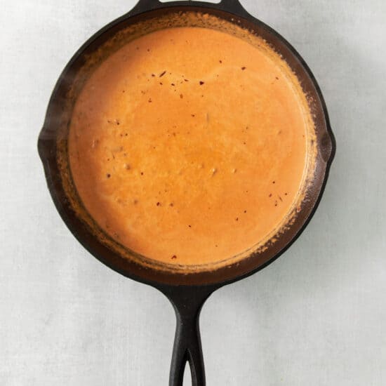 a cast iron skillet on a white background.