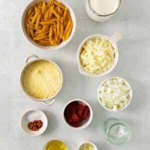 a table topped with bowls filled with different types of food.