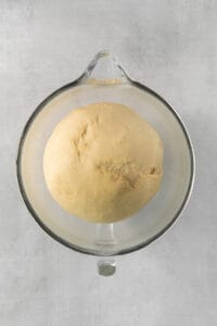 a ball of bread in a glass bowl.