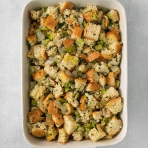 Bread stuffing in a white dish.