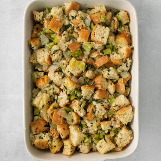 Bread stuffing in a white dish.